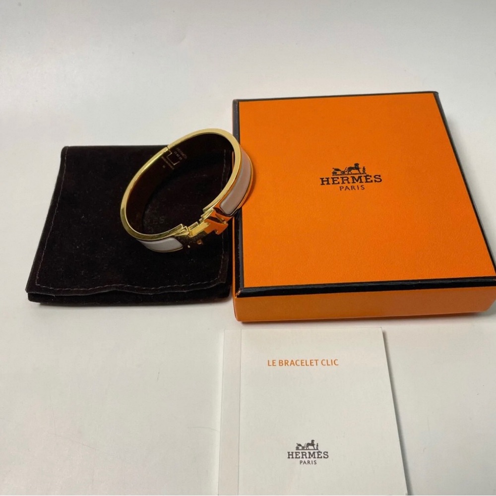 Hermes White and Gold Bracelet